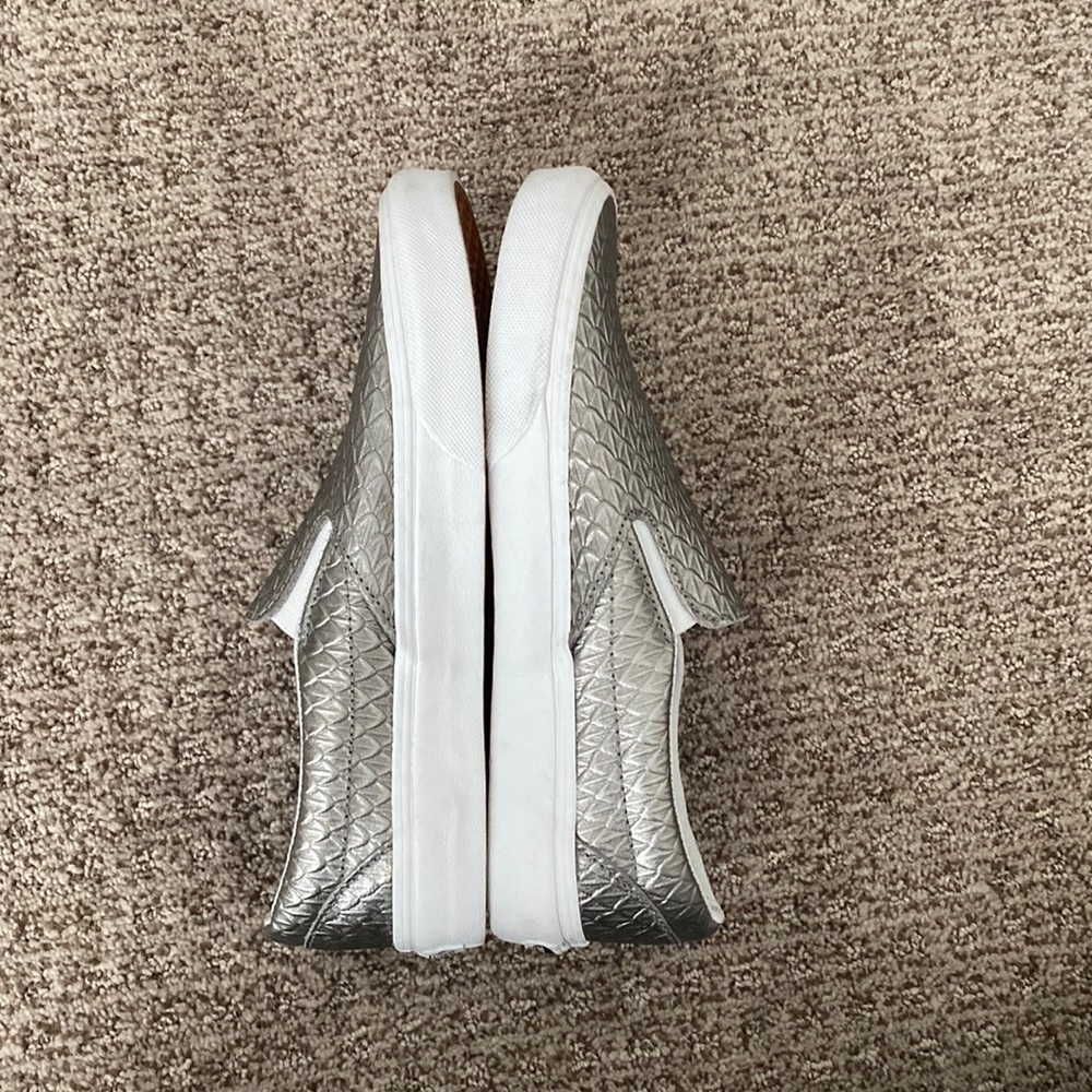 Too big in toe box. Worn once.